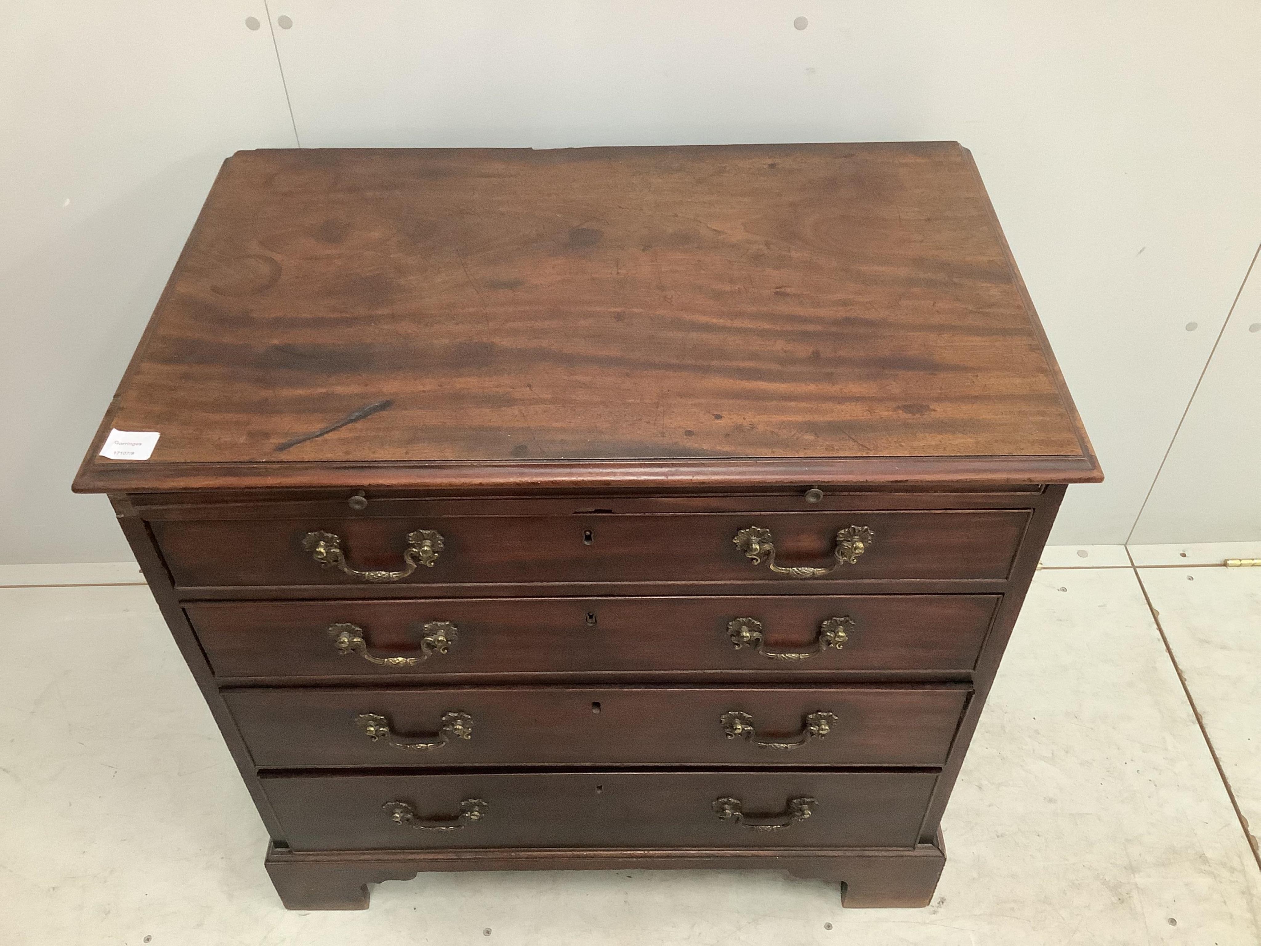 A George III mahogany chest with brushing slide, width 83cm, depth 51cm, height 81cm. Condition - fair